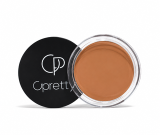 An open round makeup pot showing a warm tan-brown cream product, with the black lid leaning against it on a white background. The lid displays the white logo and brand name 'Cpretty'.